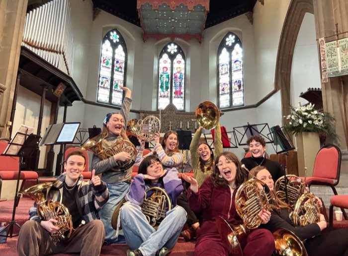 Cor8 members and friends with their horns at Chiswick Brass Festival